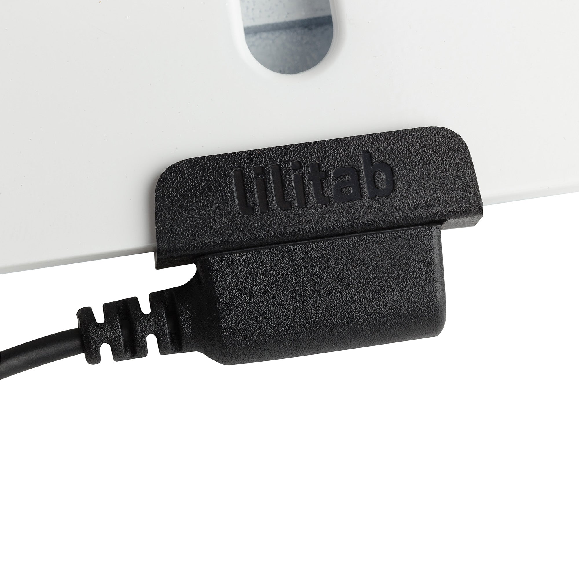 Close up of Lilitab edge-charging cable for handheld use.